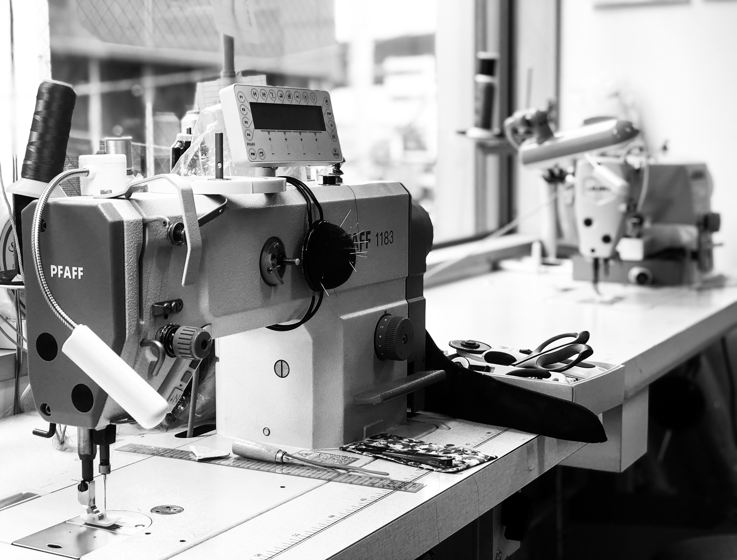 Black and white photo of sewing machine